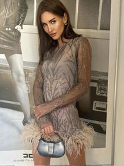 Aiertu - Women Fashion Sequins Feather Hem Mini Dress Elegant O-neck Long Sleeve Perspective Dresses 2026 New Sexy Party Club Robes Aiertu