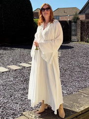 Aiertu - Chic White Ruffle Deep V-neck Maxi Dress For Women Spring Drawstring High Waist Pleated Beach Dress Long Flare Sleeve Lady Robe Aiertu