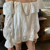 AIERTU - Commuter Style One-word Collar Hollow Embroidered Shirt Women's Spring New Ruffle Edge Loose Wear Top Aiertu