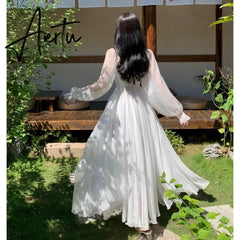 Aiertu Elegant Maxi Dresses For Women White Off Shoulder Puff Long Sleeve Elastic High Waist Party Gown Ruffle Holiday Dress Aiertu