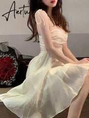 Aiertu Fairy Dress Summer Spaghetti Strap Dress Pleated Backless Corset Dress High Waist Slim Short A-Line Dress Gauze Women's Spring Clothing Aiertu