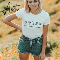 Aiertu Grow Positive Thoughts T-shirt Vintage Women Floral Print Tshirt Summer Inspired Slogan Graphic Boho Tee Top Mental Health Shirt Aiertu