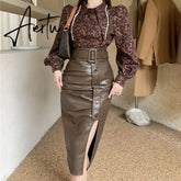 Aiertu High Waist Slim Split PU Skirt For Women Autumn Winter Fashion Wrap Hip Pleats Leather Lady Asymmetry Sexy Mid-long Skirts Aiertu