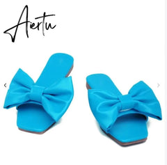 Aiertu Spring/summer new outdoor flat leather bow non-slip beach lady slippers casual all-match fashion women sandals Aiertu