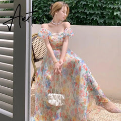 Aiertu Women's Summer Floral Dress Spaghetti Strap Dress Backless Puff Sleeves Sweet A-line Off Shoulder Midi Dress Holiday Aiertu