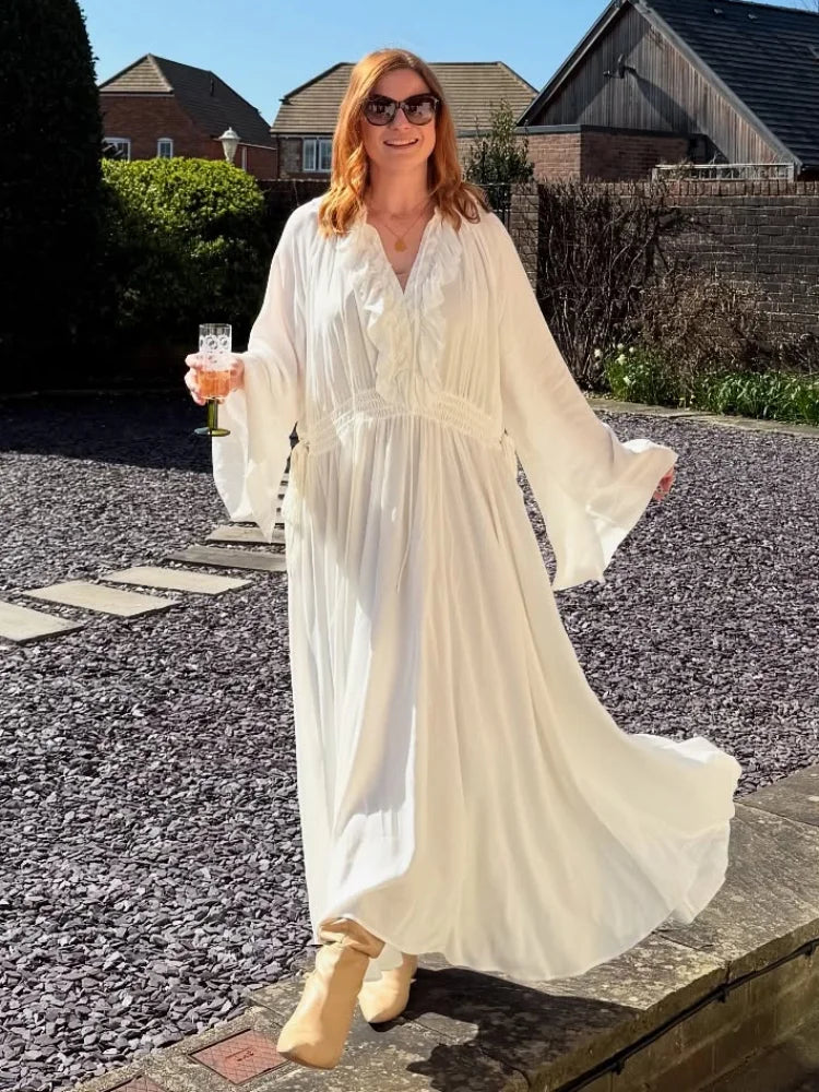 Aiertu - Chic White Ruffle Deep V-neck Maxi Dress For Women Spring Drawstring High Waist Pleated Beach Dress Long Flare Sleeve Lady Robe Aiertu