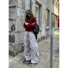 Aiertu 90s American Retro Trend Printed Letters Overalls Women Loose Fold High Street Korean Casual Sports Couple Wide leg Pants Unisex Aiertu