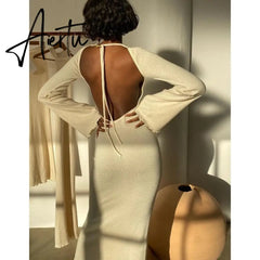 Solid knitted open back flared long sleeve maxi dress elegant sexy clothes for women fall resort wear Aiertu