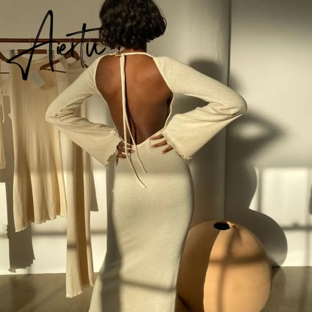 Solid knitted open back flared long sleeve maxi dress elegant sexy clothes for women fall resort wear Aiertu