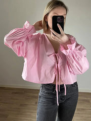 Aiertu  -  Cotton Bow Lace Up Shirt Women Elegant V-neck Hollow Out Long Lantern Sleeve Shirts 2026 Spring Summer Casual Loose Fashion Tops Aiertu