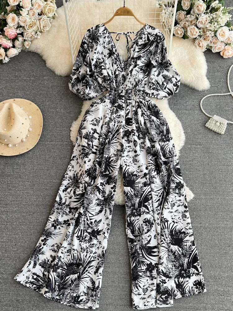 Aiertu Summer Women Sexy V-Neck Puff Sleeve Printed Romper Female Black/Red/Blue/Yellow Wide Leg Jumpsuits Vacation Beach New Fashion Aiertu