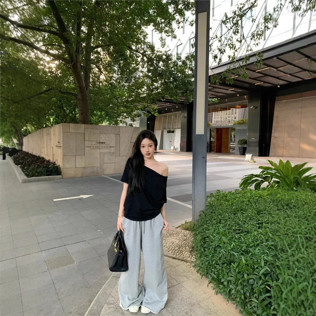 Aiertu  -  Spicy Girl Slant Shoulder Short Sleeve Loose T-shirt 2025 Women's Summer New Casual Irregular Solid Color Versatile Top Aiertu