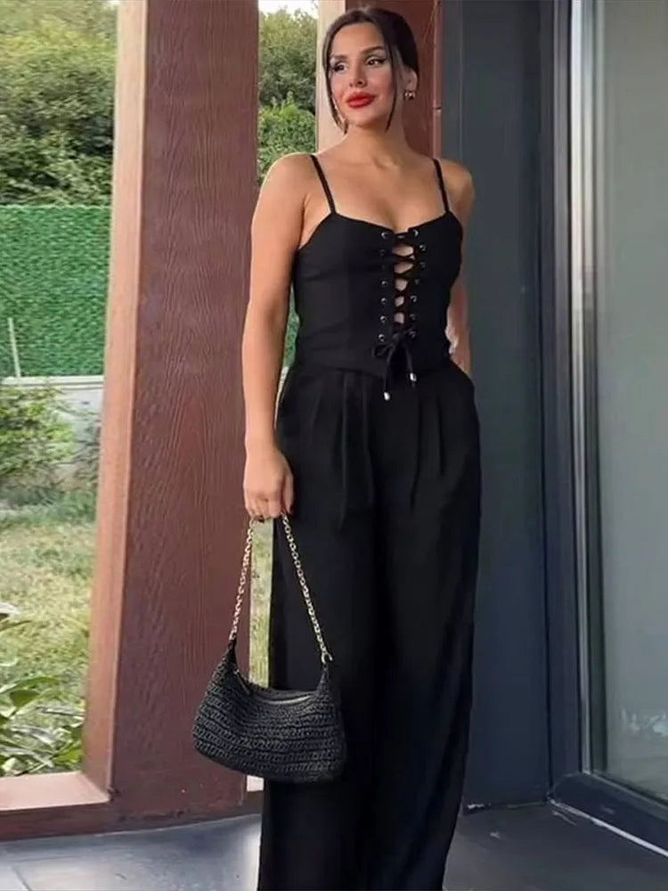 Aiertu  -  Strap Camisole Vest High Waist Pants Women Suit Sexy Hollow Top Straight Tube Loose trousers 2026 Summer Vacation Casual Set Aiertu