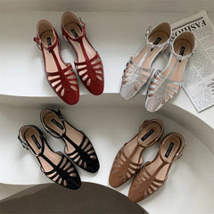 Aiertu  -   T-strap Rome Flat Sandals Women Hollow Out Vintage Summer Mary Janes Shoes Ladies Pu Leather Holiday Elegant Gladiator Sandals Aiertu
