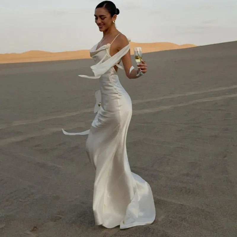 Aiertu  -  White Satin Backless Long Dress Women Sexy SleevelessTassels Flower Decor Bodycon Robes 2025 Elegant Holiday Party Maxi Dresses Aiertu