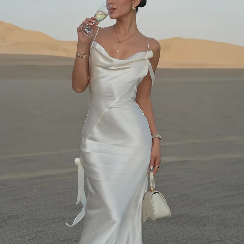 Aiertu  -  White Satin Backless Long Dress Women Sexy SleevelessTassels Flower Decor Bodycon Robes 2025 Elegant Holiday Party Maxi Dresses Aiertu