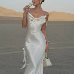 Aiertu  -  White Satin Backless Long Dress Women Sexy SleevelessTassels Flower Decor Bodycon Robes 2025 Elegant Holiday Party Maxi Dresses Aiertu