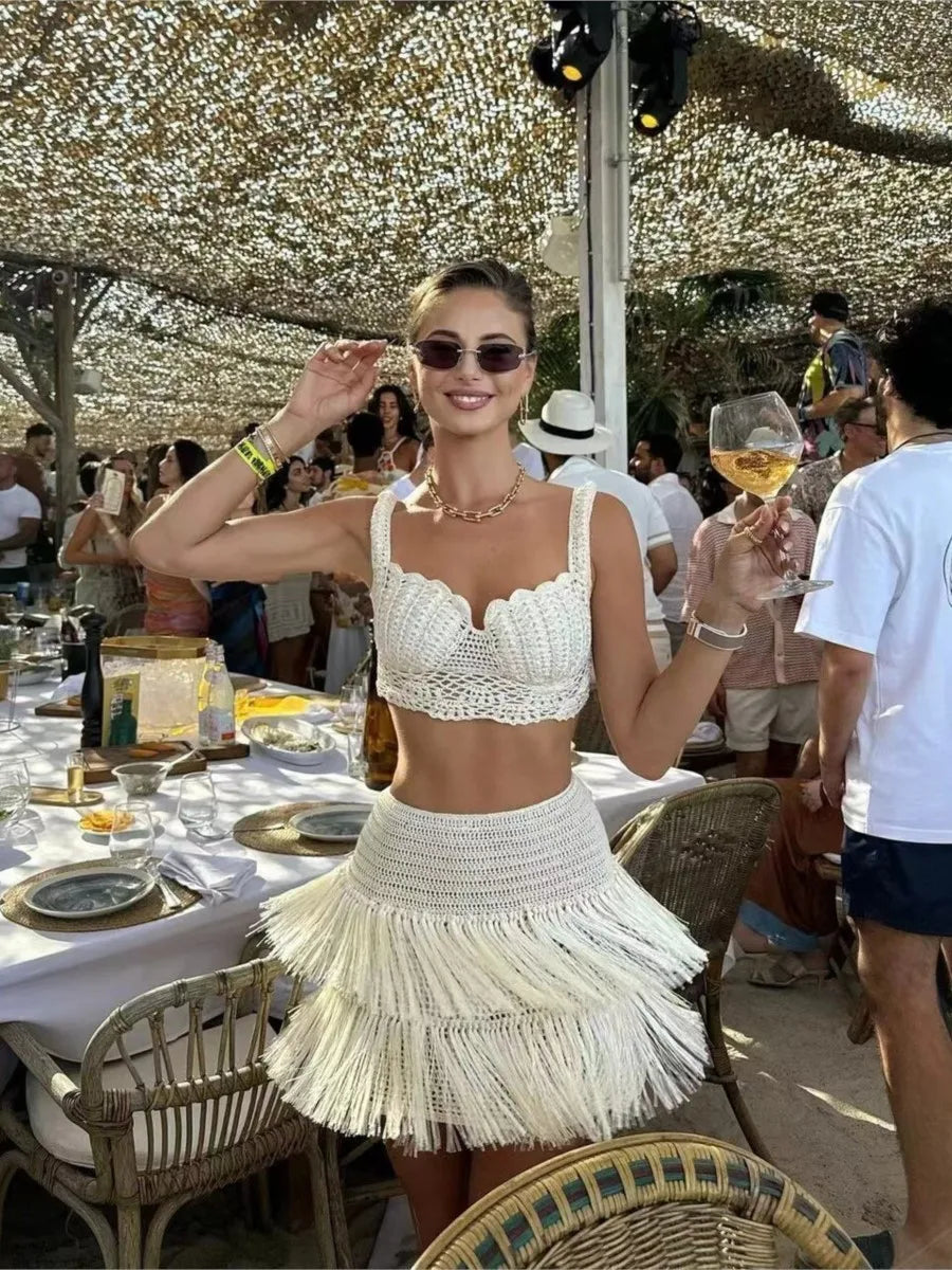 Aiertu  -  Hollow Out Knit Two Piece Set Women Sleeveless Cropped Tank Top+Tassel Mini Skirts Summer Holiday Elegant Sexy Skirts 2025 New Aiertu