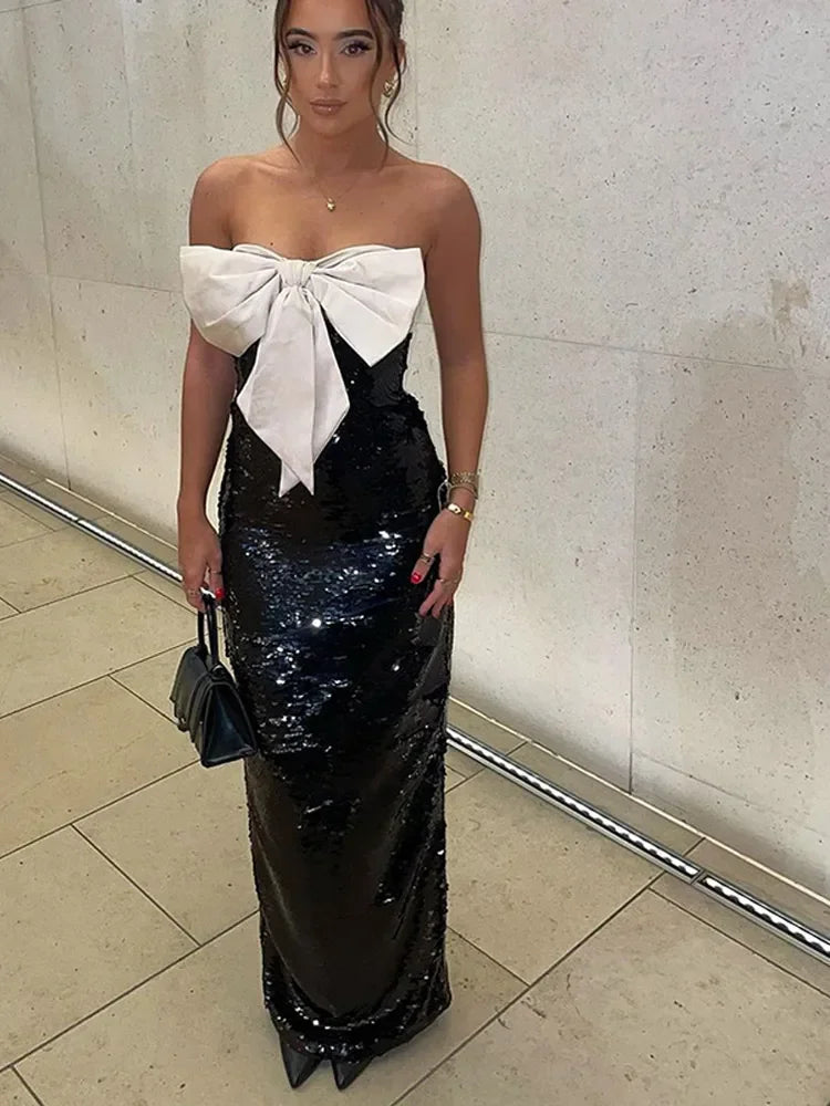 Aiertu  -  Elegant Bow Decoration Glossy Sequins Long Dress Women Off Shoulder Backless High Waist Robes 2026 Elegant Lady New Party Gowns Aiertu
