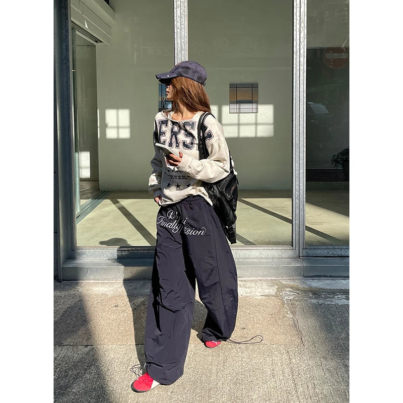 Aiertu  90s American Retro Trend Printed Letters Overalls Women Loose Fold High Street Korean Casual Sports Couple Wide leg Pants Unisex Aiertu