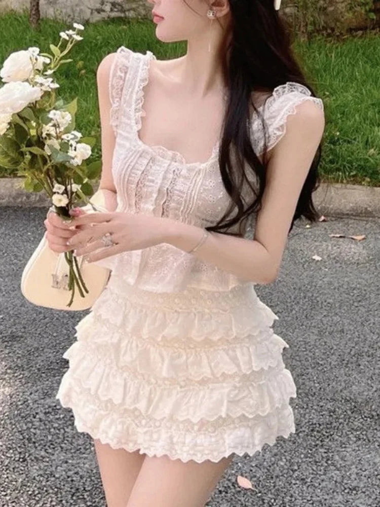 Aiertu  -  Sweet Women's Summer New Fashion Patchwork Ruffles Lace Hollow Out Sleeveless Slim Suspenders Tops Cake Half Skirt Two Piece Set Aiertu