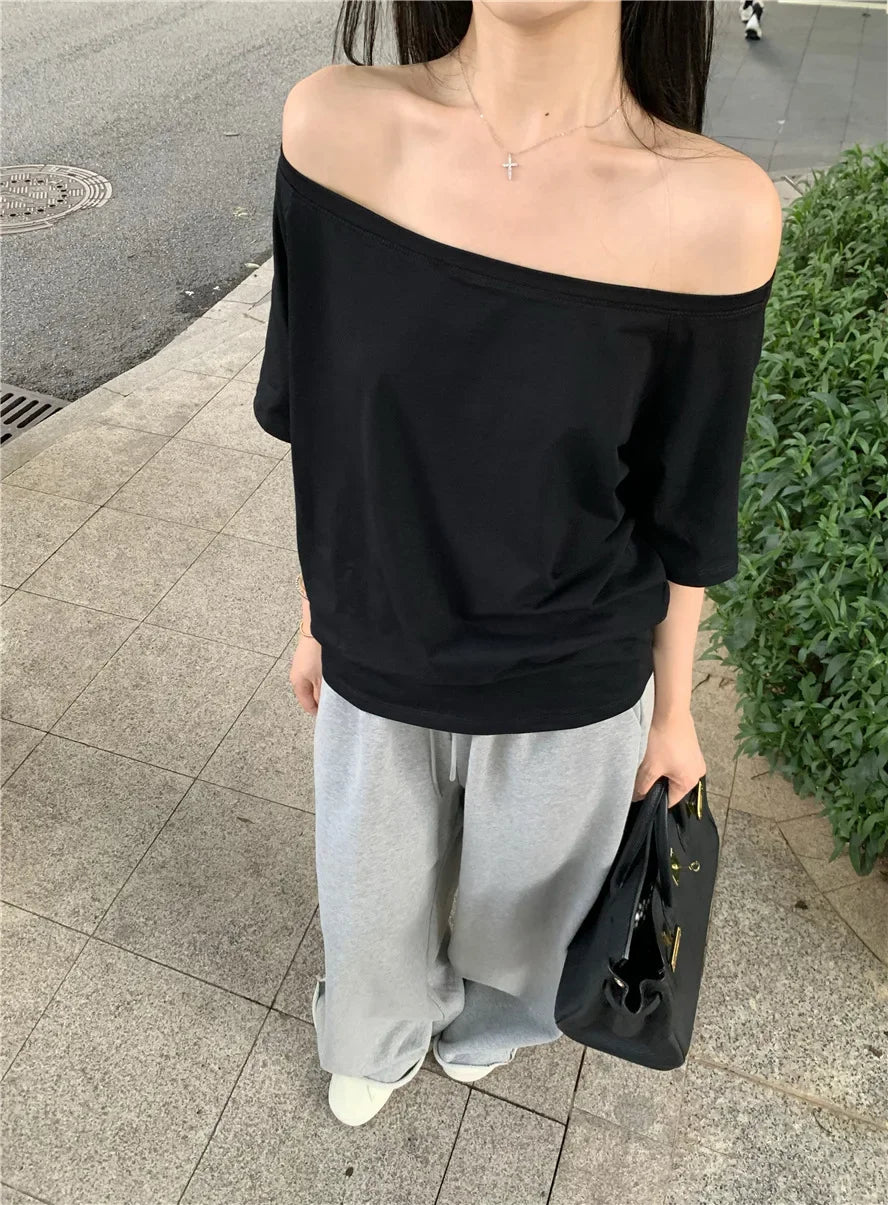 Aiertu  -  Spicy Girl Slant Shoulder Short Sleeve Loose T-shirt 2025 Women's Summer New Casual Irregular Solid Color Versatile Top Aiertu