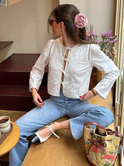 Aiertu  -  Ladies Sweet Lace Embroidery White Shirt New French Spring Ladies Round Neck Lace Hem Short Blouse Top Versatile 2025 Aiertu