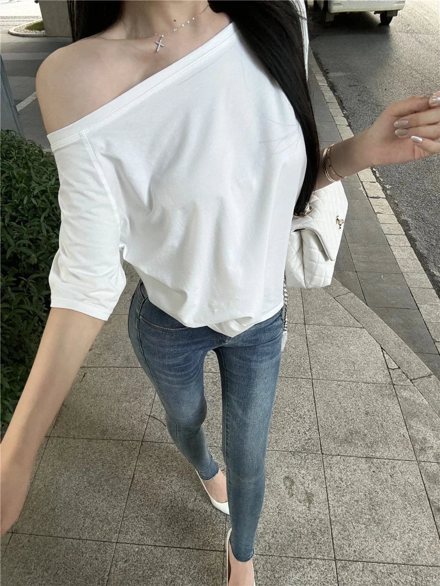 Aiertu  -  Spicy Girl Slant Shoulder Short Sleeve Loose T-shirt 2025 Women's Summer New Casual Irregular Solid Color Versatile Top Aiertu