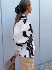 Aiertu  -  Elegant Printed Puff Sleeve Shirts Women Belt Turn Down Collar V-neck Coats Female 2026 Spring Fashion Office Lady Streetwear Aiertu