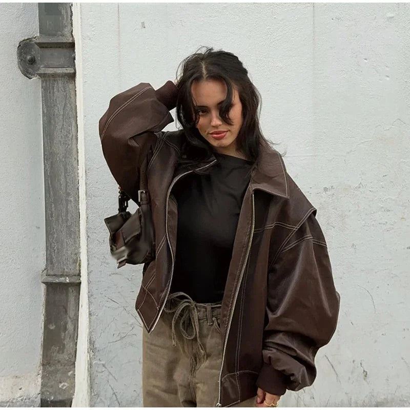 Aiertu  -  Loose Patchwork Leather Jackets Women Fashion Lapel Zipper Pockets Long Sleeve Coats 2026 Autumn New Female Chic Tops Streetwear Aiertu