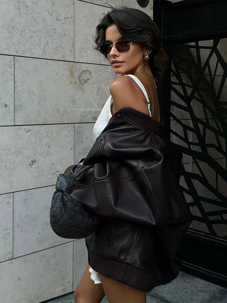 Aiertu  -  Chic Solid Zipper Pocket Pu Leather Jacket Women Fashion Long Sleeved Single Breasted Loose Motorcycle Coats 2026 Lady Outercoat Aiertu
