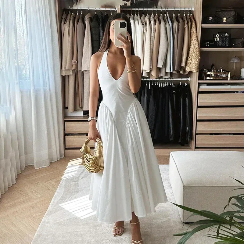 Aiertu  -  Sexy Deep V Hollow Halterneck Large Hem Dress For Women Solid High Waisted Backless Splice Summer New Vacation Long Dress Aiertu
