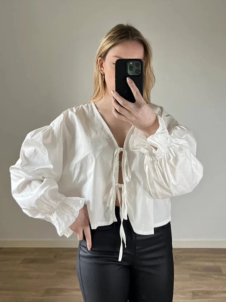 Aiertu  -  Cotton Bow Lace Up Shirt Women Elegant V-neck Hollow Out Long Lantern Sleeve Shirts 2026 Spring Summer Casual Loose Fashion Tops Aiertu
