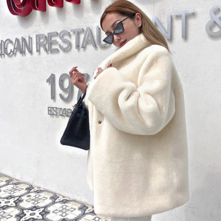 Aiertu  -  Winter Warm Plush Faux Fur Coat Women Thick Middle Long Overcoat Turn Down Collar Women Female Loose Faux Rabbit Fluffy Jacket Aiertu