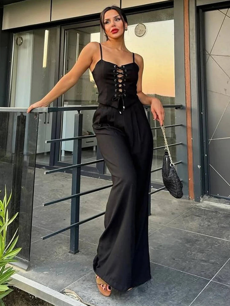 Aiertu  -  Strap Camisole Vest High Waist Pants Women Suit Sexy Hollow Top Straight Tube Loose trousers 2026 Summer Vacation Casual Set Aiertu