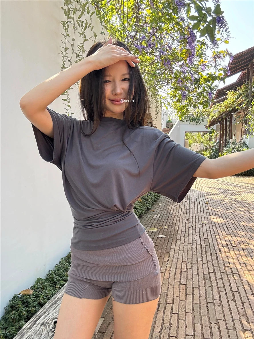 Aiertu  -  O-neck Pleated Asymmetric Casual Short-sleeved T-shirt Women 2026 Summer New High Street Fashion Solid Color All Match Tops Aiertu