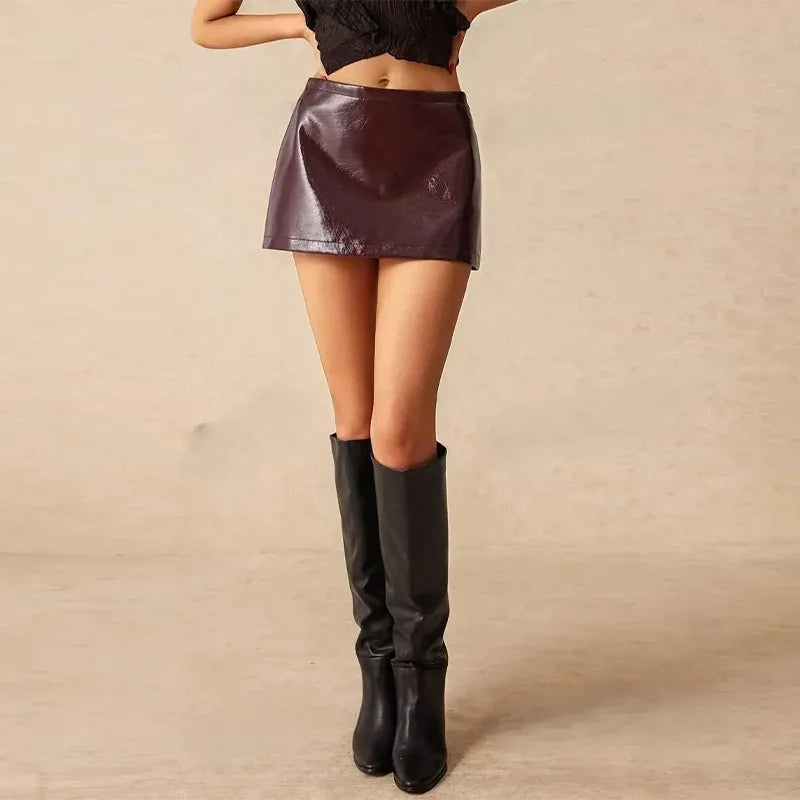 Aiertu  -  Sexy Faux Leather Mini Skirts Women Fashion High Waist A-line Pencil Skirts Ladies Hip Wrappe Pu Mini Skirts Summer 2025 Aiertu