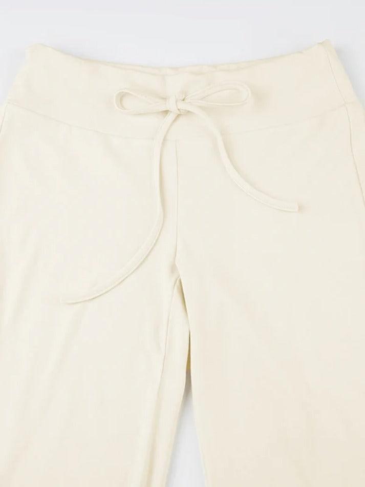 Aiertu  Solid Turned Waist Tie Up Flare Leg Pants Aiertu