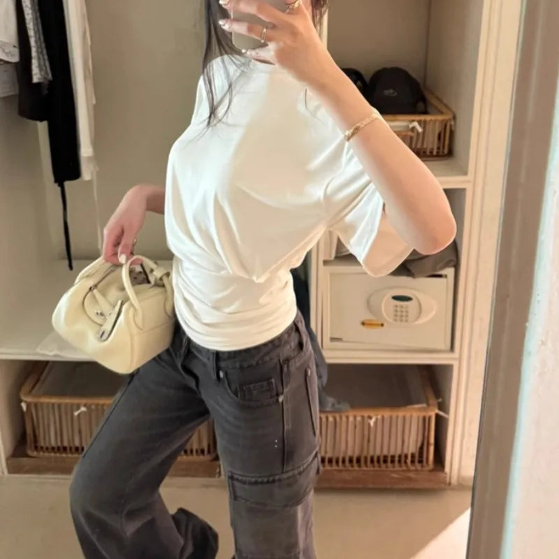 Aiertu  -  O-neck Pleated Asymmetric Casual Short-sleeved T-shirt Women 2026 Summer New High Street Fashion Solid Color All Match Tops Aiertu