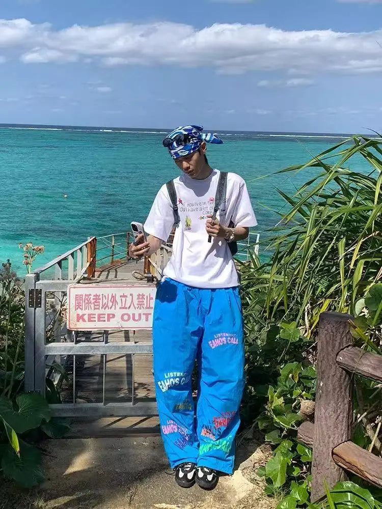 Aiertu  -  Summer new dopamine letter design sports wide-leg paratrooper pants American retro beach mopping trousers Aiertu