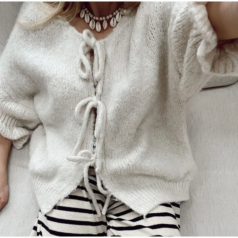 Aiertu  -  Lace Up Bow Women's Sweater Fashion Flared Sleeve O-neck Loose Female Knit Cardigan 2026 Autumn Street Casual Lady Knitwear Aiertu