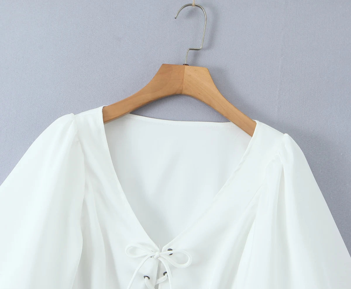 Aiertu  -  Summer eyelets Cross Lacing Up Bow Front Short Lantern Sleeve Shirt + Low Waist Package Hips Ruffles Hem Mini Skirt Sets Aiertu