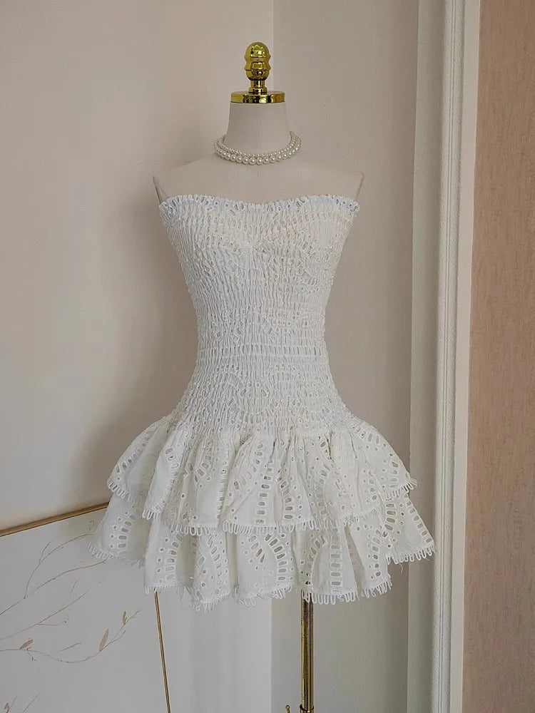 Aiertu  -  Summer Hollow Out Embroidery Cake Dress Women Sexy Beach Strapless Halter Stretch Cotton Spliced Layer Lace Trims Mini Vestidos Aiertu
