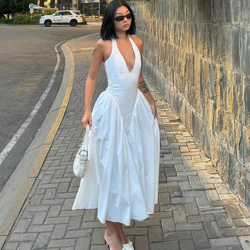 Aiertu  -  Sexy Deep V Hollow Halterneck Large Hem Dress For Women Solid High Waisted Backless Splice Summer New Vacation Long Dress Aiertu