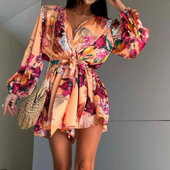 Aiertu  -  Spring Fashion Flower Print Short Jumpsuit Women Elegant V Neck Lace-up Romper Playsuits Autumn Long Sleeve Office Lady Overalls Aiertu
