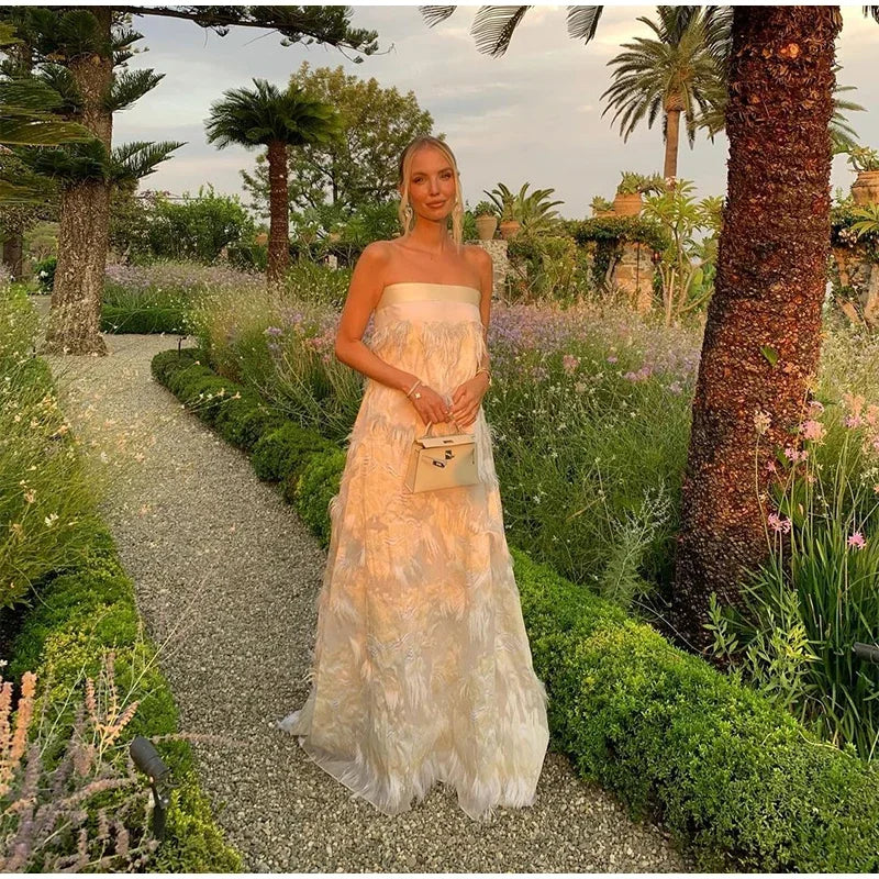 Aiertu  -  White Elegant Feathers Off Shoulder Strapless Maxi Dress Women Backless Wrapped Chest Loose Robes 2026 Wedding Party Dresses Aiertu