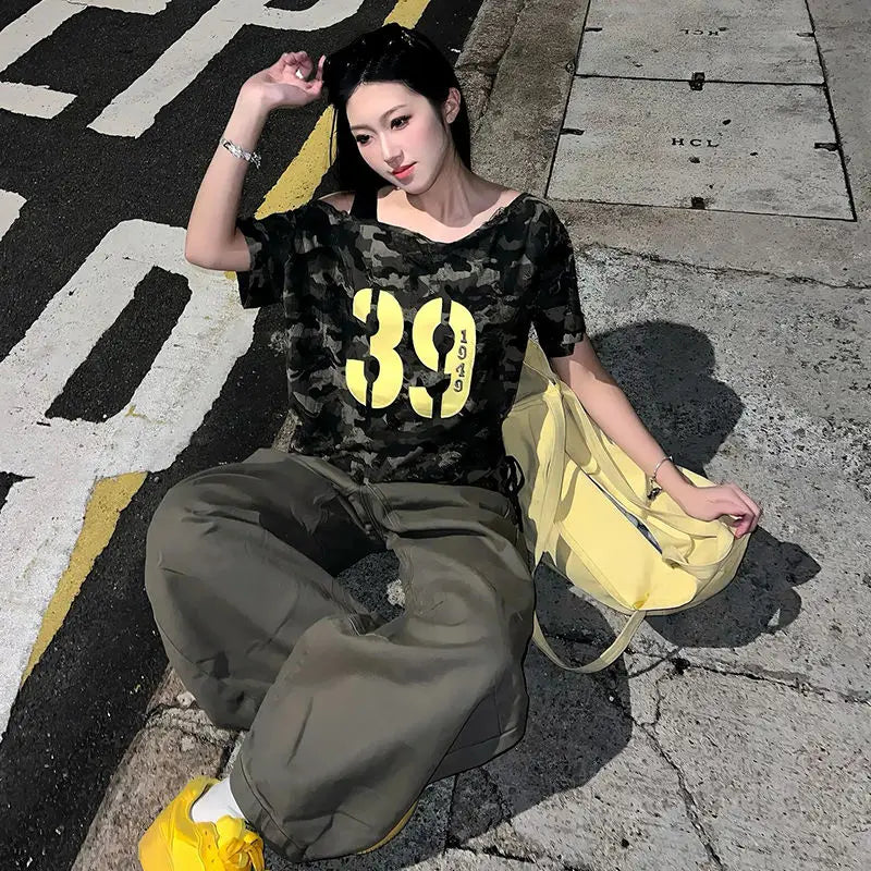 Aiertu  -  street slanted shoulder t-shirt women's summer new camouflage short-sleeved y2k loose and thin off-the-shoulder machine top Aiertu