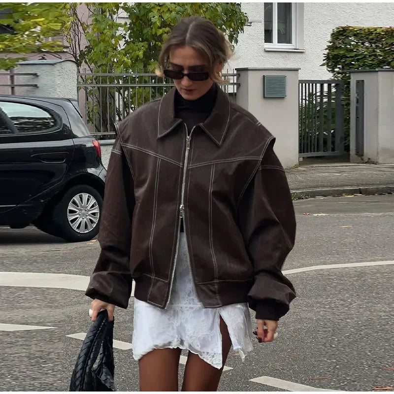 Aiertu  -  Loose Patchwork Leather Jackets Women Fashion Lapel Zipper Pockets Long Sleeve Coats 2026 Autumn New Female Chic Tops Streetwear Aiertu