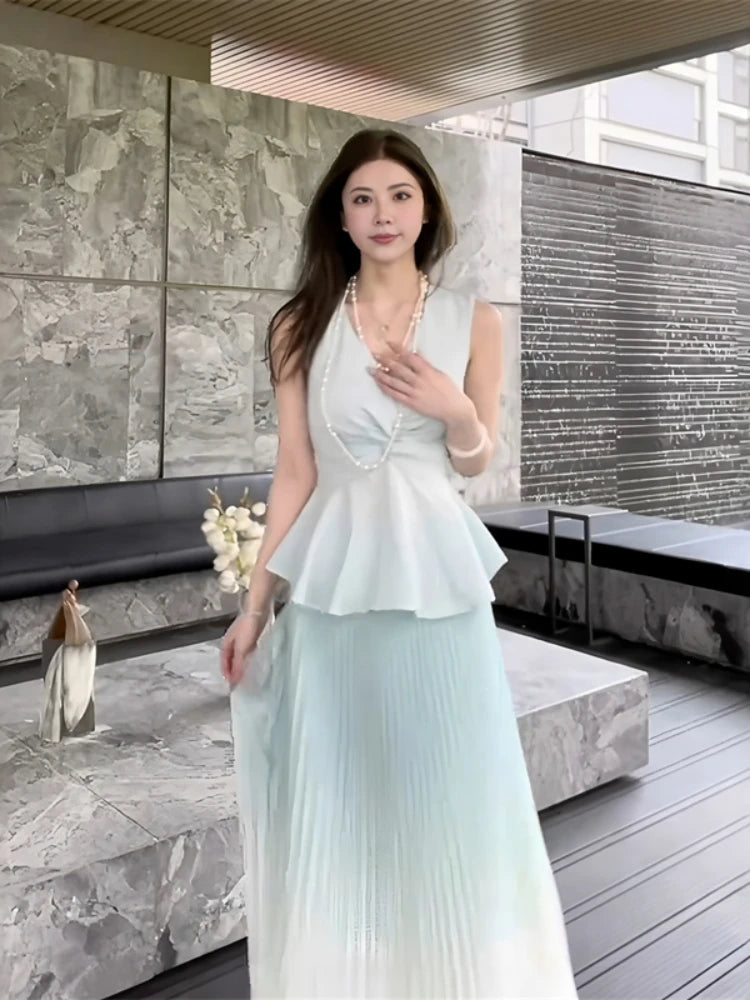 Aiertu  -  High-end temperament elegant set women spring summer V-neck sleeveless top pleated half body long skirt two-piece set Aiertu