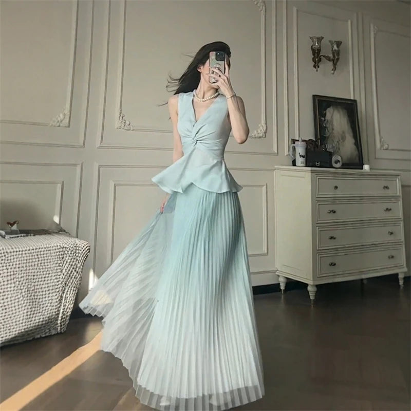 Aiertu  -  High-end temperament elegant set women spring summer V-neck sleeveless top pleated half body long skirt two-piece set Aiertu